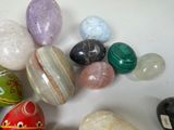 many different types of rocks and stones on the table