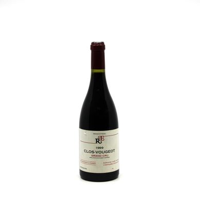 a bottle of wine that is sitting on a table