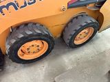 two tires on the back of a small tractor