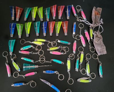 a lot of different types of fishing lures on the table