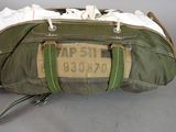 a duffel bag that is sitting on the floor