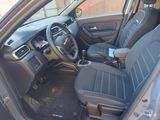 the interior of a car with black leather seats and a steering wheel