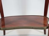 a wooden shelf with a glass shelf on top of it