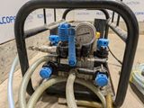 a machine that has a bunch of hoses attached to it