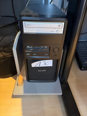 a desktop computer sitting on top of a desk