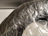 a close up of a metal bowl with a liquid inside of it
