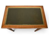 an image of a small table with a black top and gold trim