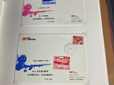an open book with stamps and a picture of a plane on it