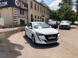 a white car that is parked in front of a building