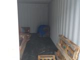 a picture of a storage container with pallets in it