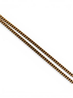 a pair of gold chains on a white background