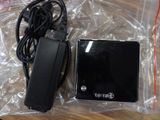 a black box with a charger and a charger on it