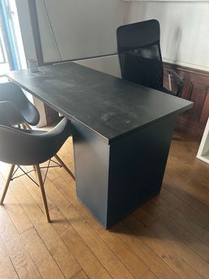 an image of a desk with a chair and a bookcase