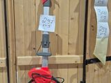 an image of a red wheel on display at a show