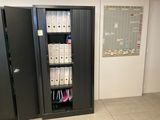 an image of a filing cabinet with files in it