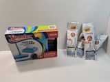 a box of toothpaste next to a package of toothpaste