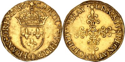 a gold coin with a crown on top of it