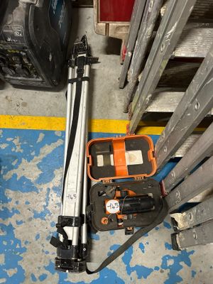 tools that are sitting on the floor next to the stairs