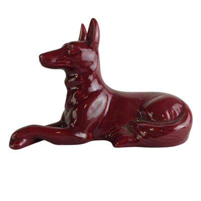 an image of a red dog figurine on a white background