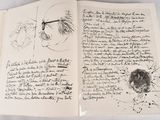 an open book with a drawing of a man ' s face on it