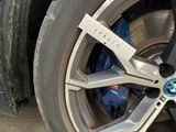 a close up of a tire with a sticker on it