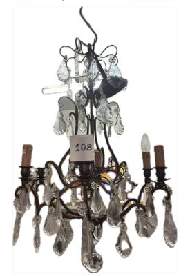 a chandelier that has a lot of glass hanging from it