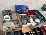 many boxes of assorted items sitting on a table