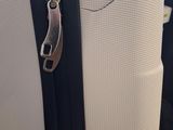 a piece of luggage that is sitting in the back seat of a car