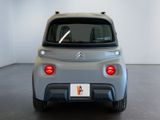 a small car that is parked in a room