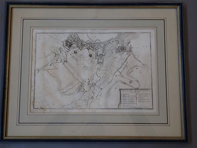 une photo représentant un dessin d'une carte accrochée au mur