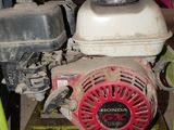 a small engine that is sitting under a table