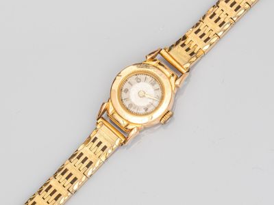 Montre Rolex pour femme à bracelet en or 18 carats