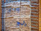 an image of a rug on the floor with a horse drawn carriage on it