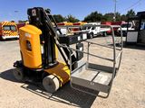 a forklift that is parked in a parking lot