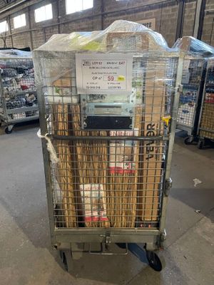 a cart with a lot of items in it in a warehouse