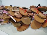many pairs of women ' s shoes on display on a table