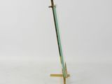 pair of brass and glass coat racks in the style of person