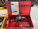 a red box that has a bunch of tools inside of it