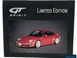 a box with a picture of a red sports car in it