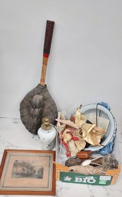 a picture of a baseball bat and other items on the floor