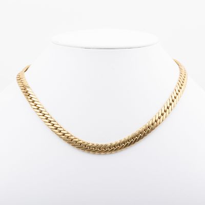 a gold chain necklace on a mannequin mannequin mannequin mannequin mannequin mannequin mannequin mannequin manne