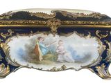 a blue and gold box with a picture of a woman and a child on it