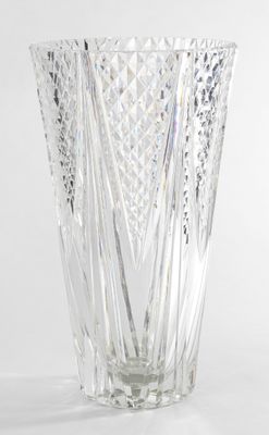 a glass vase that is sitting on a table