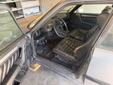 a picture of the inside of a car with the door open