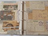 an open book with a bunch of old photos on it