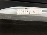 a sticker that says vauto on the back of a car