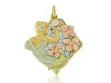 une image représentant un pendentif en or orné de fleurs et d'un oiseau