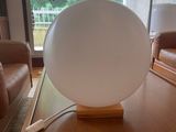 a lamp that is sitting on a table in a living room