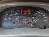 a close up of a speedometer in a car