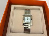 a watch that is in a box with a watch inside of it